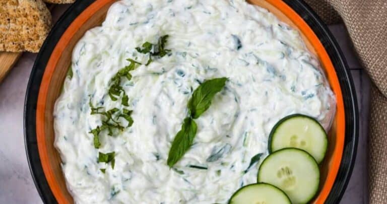 tzatziki sauce in a bowl with cucumber